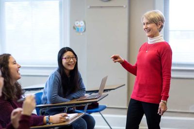 Professor interacting with students in class 